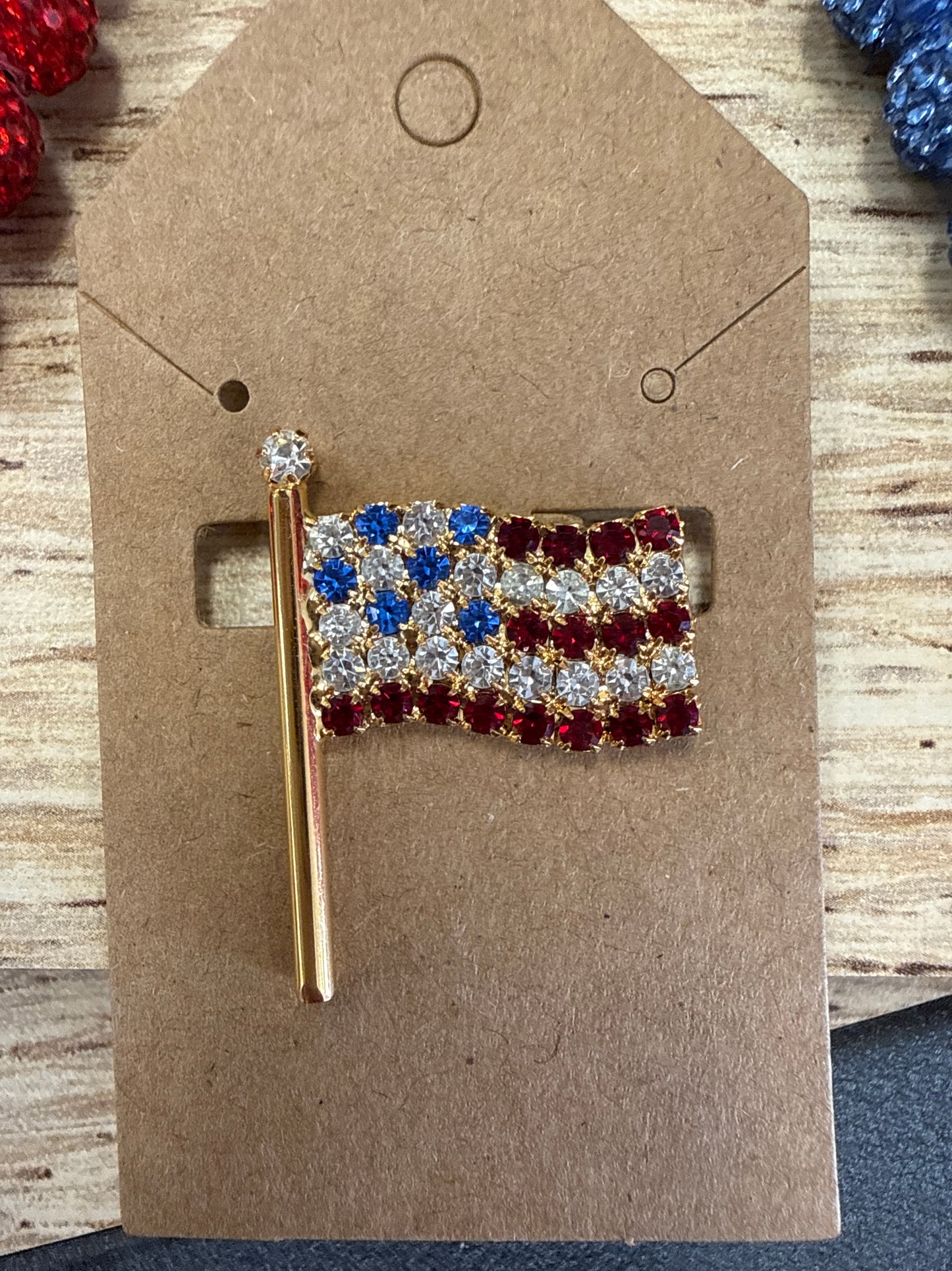 red white and blue brooch