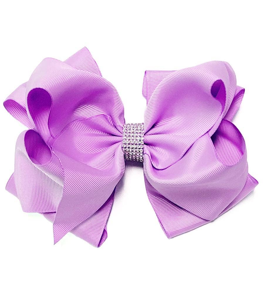 LT. ORCHID HAIR BOW WITH RHINESTONES .