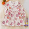The Shimmer Shack Pumpkin Printed Dress w/ Bubble Sleeve