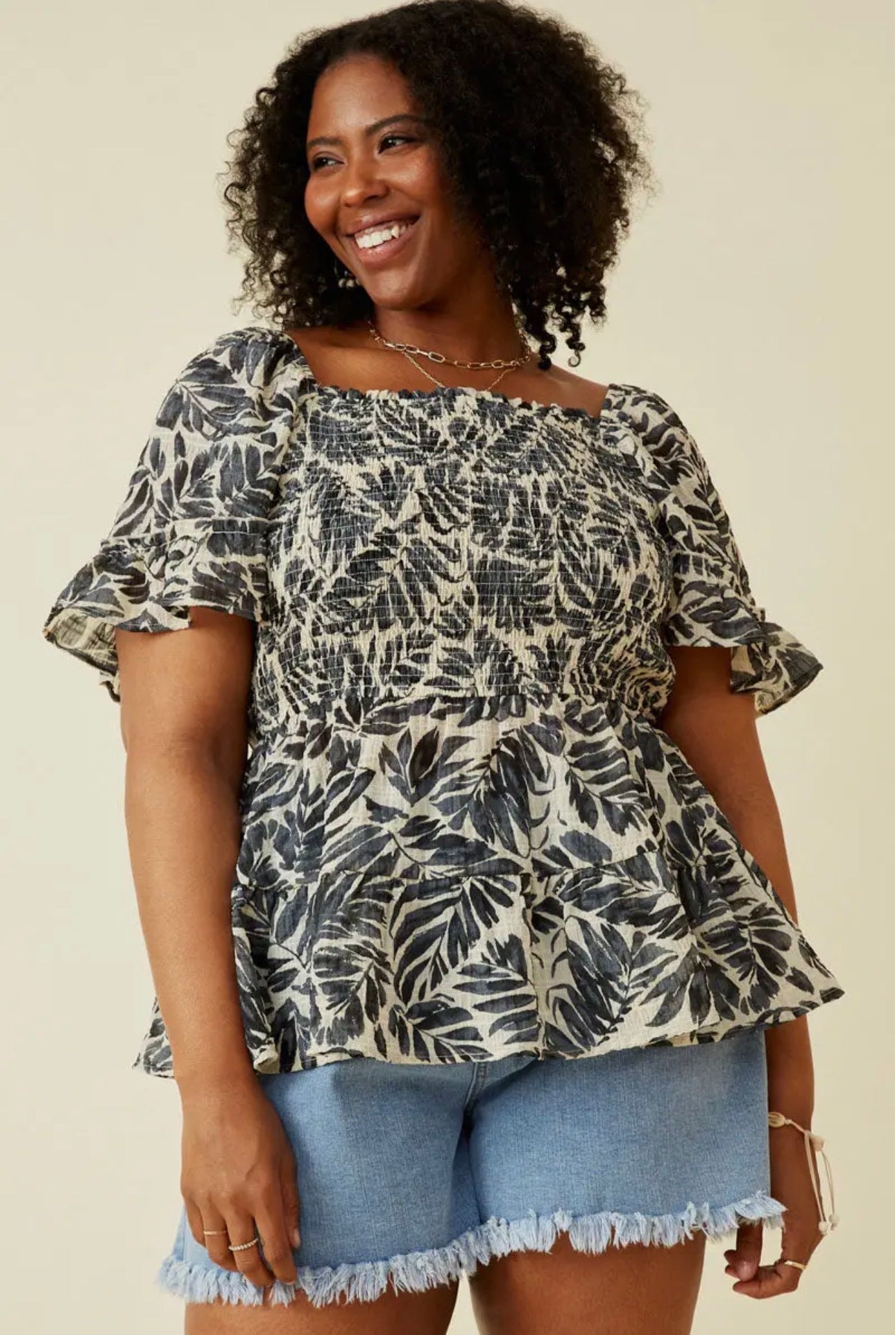 The Shimmer Shack PLUS Black and Cream Smocked Top