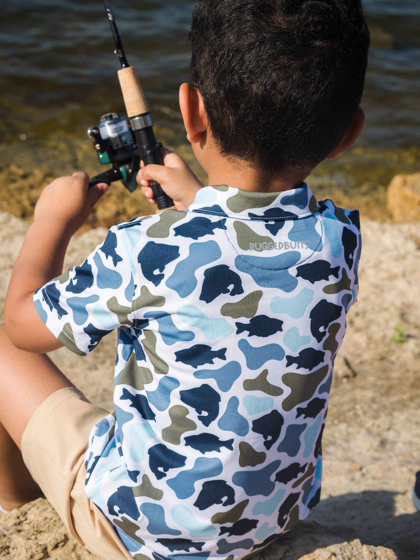 RuffleButts + RuggedButts - Boys Fish Camo Catch Knit Short Sleeve Performance Polo