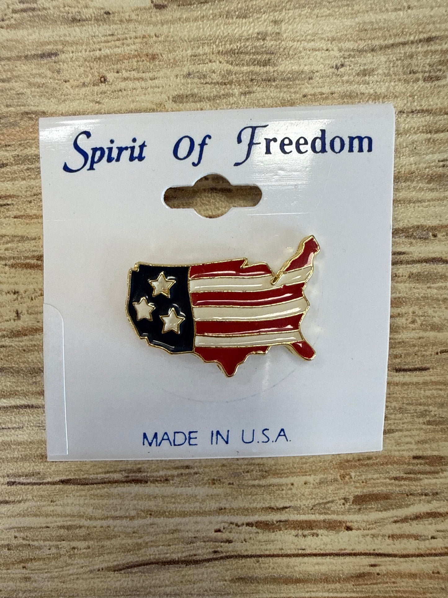 red white and blue brooch
