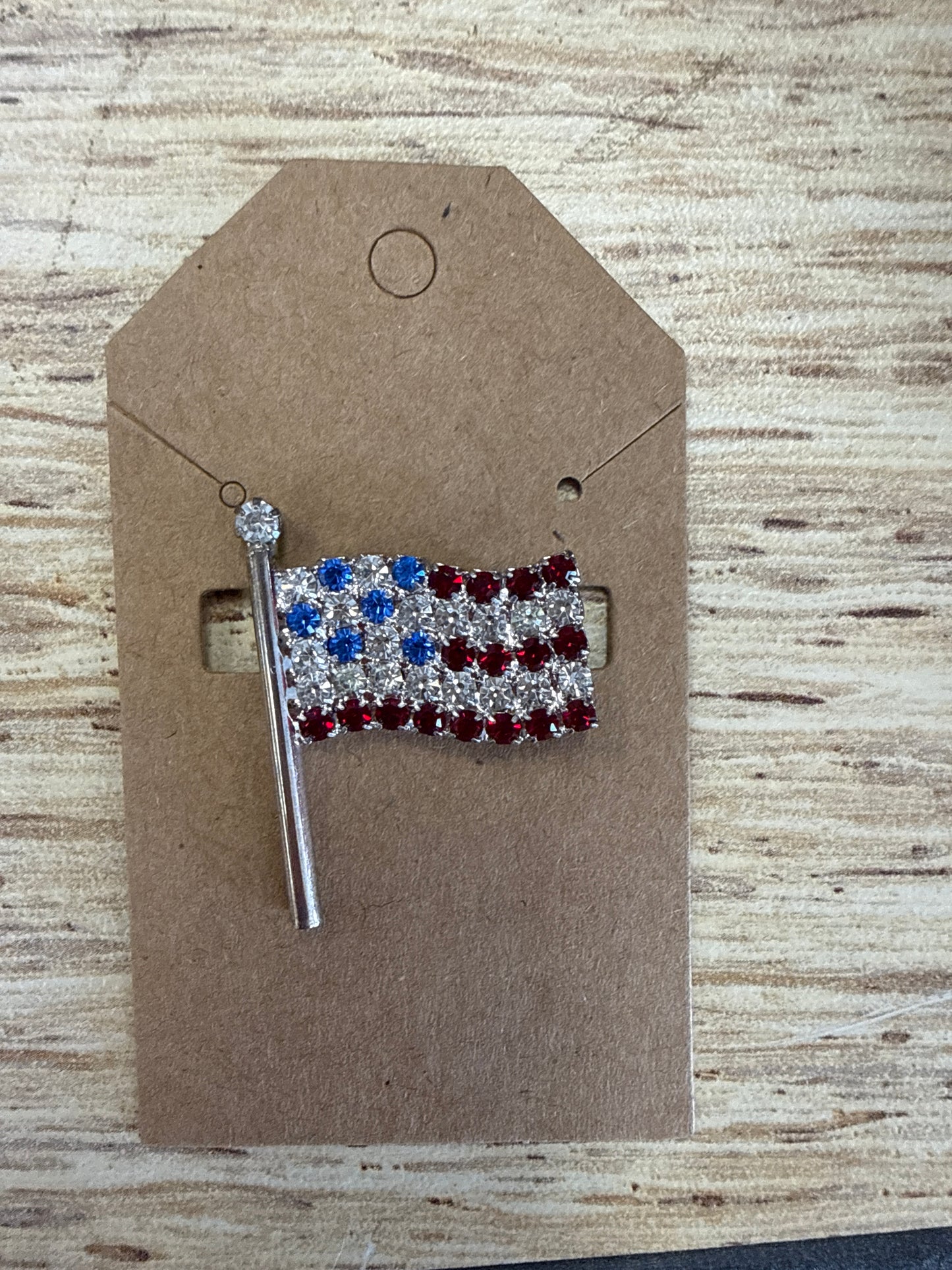 red white and blue brooch