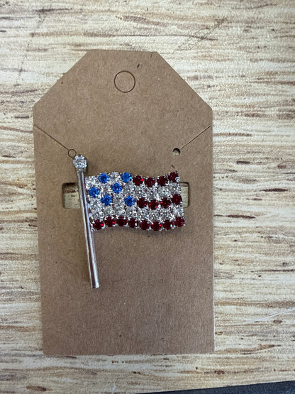 red white and blue brooch