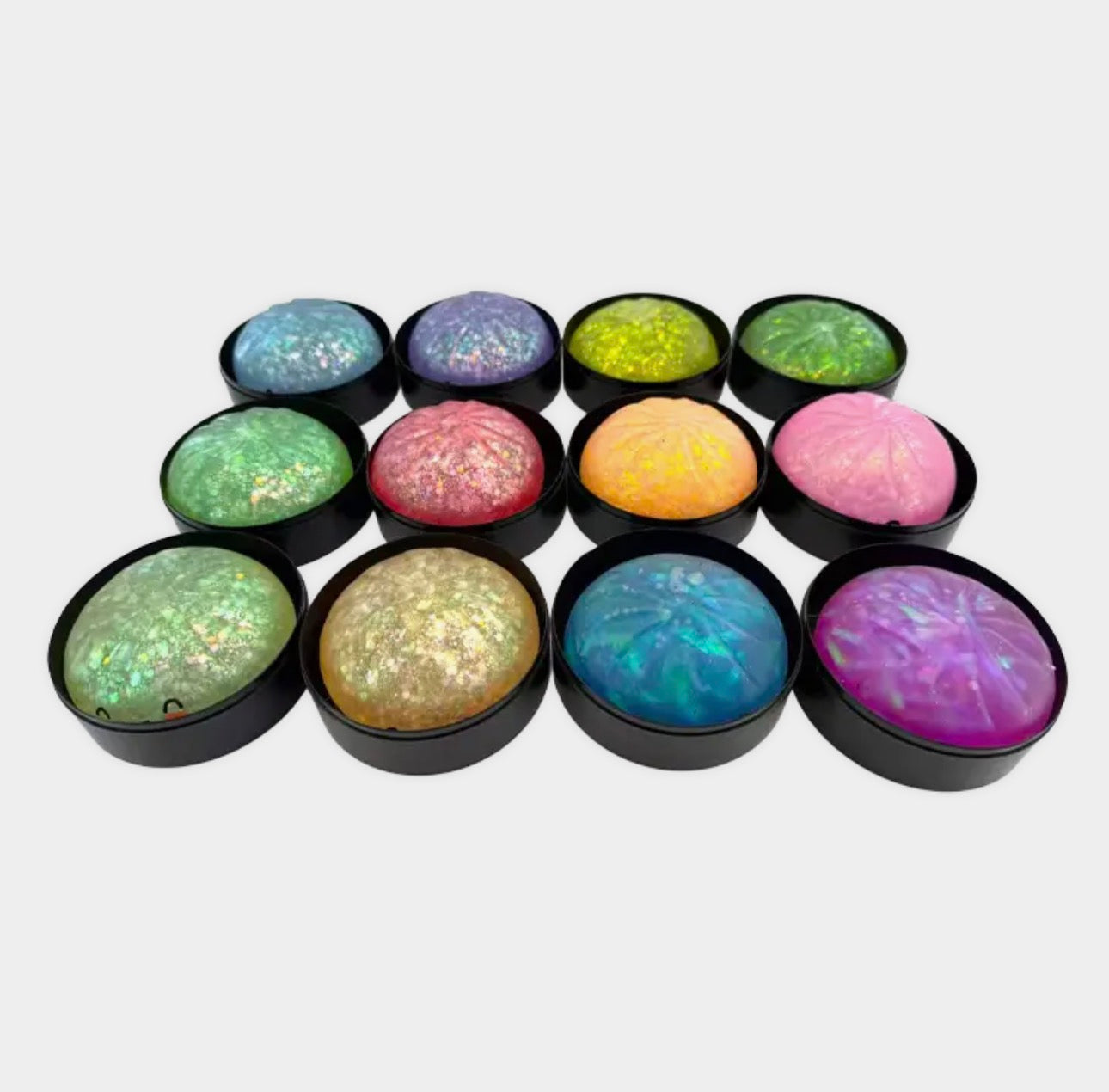 The Shimmer Shack Fun Doh Glow in the Dark Squishy Dumplin Collection