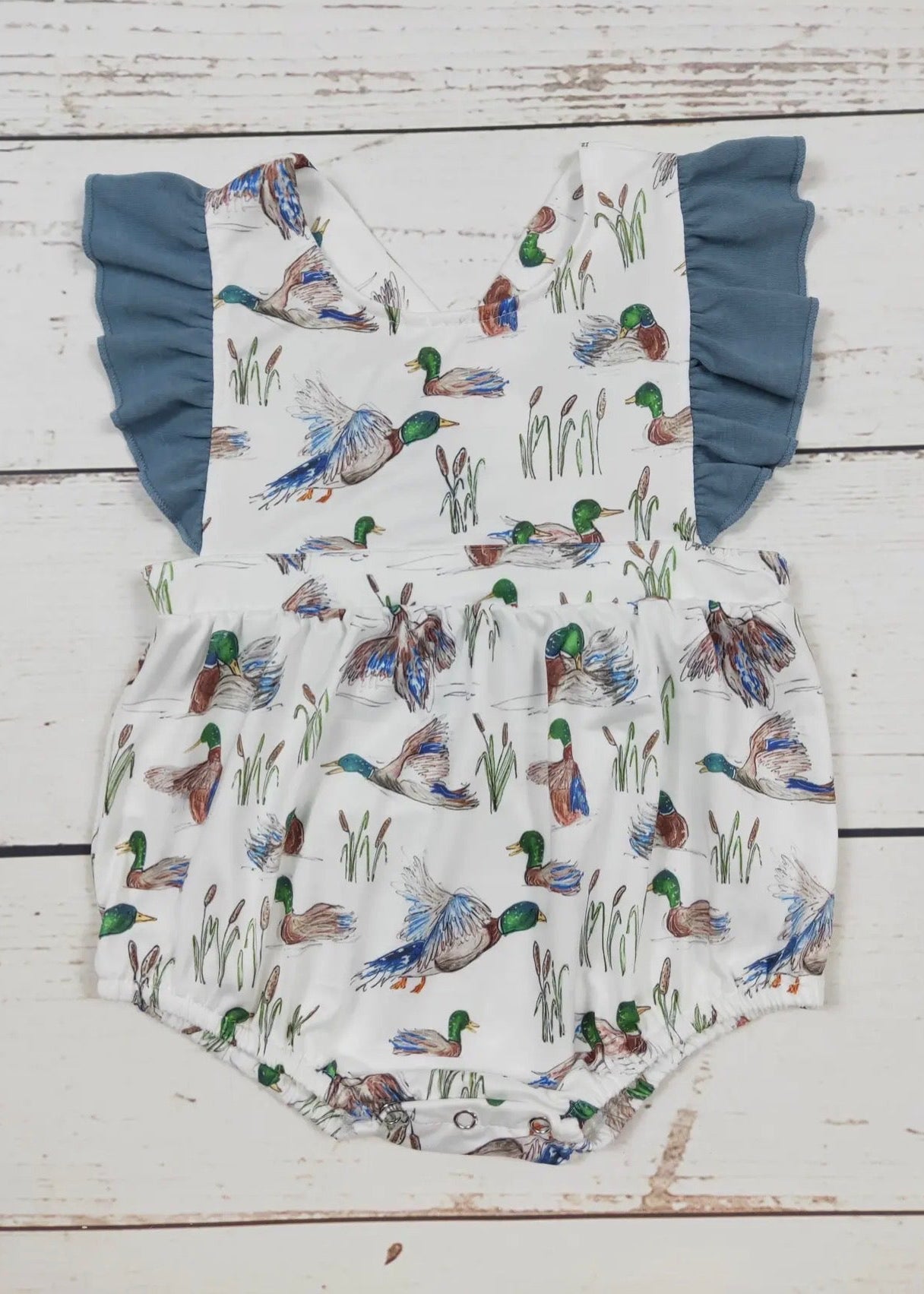 The Shimmer Shack Baby Girl Duck Printed Ruffle Romper