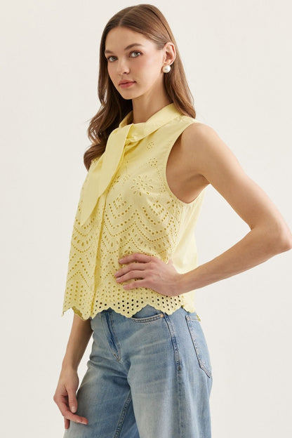 Lemon sleeveless top featuring eyelet embroidery detail
